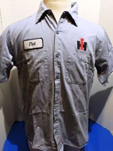 Mechanic shirts feature the patches of reputable manufacturing companies and enhance the author’s persona by creating associations with hard-working grease monkeys: $20.